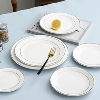 Assiettes à steak rondes en céramique avec bord doré de qualité supérieure, vaisselle plate peu profonde créative