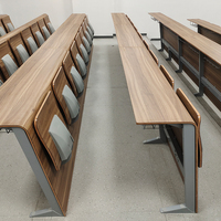 Tables et chaises scolaires en bois massif avec pieds fixes Salles de conférence universitaires Sièges en rangée pour salles de classe multimédia