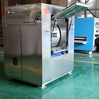 Laveuse-essoreuse industrielle 50 kg avec protection mécanique et barrière sanitaire pour équipements de blanchisserie destinée aux établissements de santé