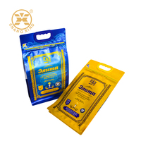 Sac d'emballage pour riz en aluminium et plastique BOPP à fond plat, imprimé sur mesure, avec poignée, 1KG 2KG 5KG, caractéristiques barrière, prix usine