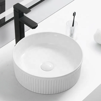 Lavabo de salle de bain moderne en céramique, rond, cannelé, à poser sur comptoir, qualité hospitalière