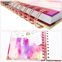 2026 2027 vente en gros personnalisé impression spirale hebdomadaire quotidien cahier rose objectif planificateur avec autocollants