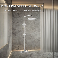 Ensemble de douche mural design moderne en laiton brossé à double poignée, avec jets pluie et massage, barre coulissante et cartouche céramique