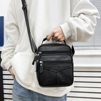 Sac à bandoulière en PU durable avec plusieurs compartiments pour garder les essentiels bien organisés, excellente idée de cadeau pour papa ou mari B0022