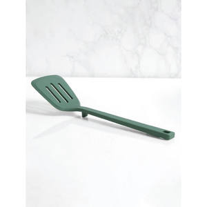 Utensile per cani Flip in Silicone verde che non tocca il pavimento - Product Image 1