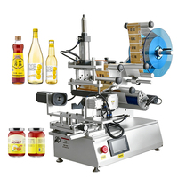 Machine d'étiquetage rotative automatique de bureau stable pour pots de miel, de sauce et de boissons