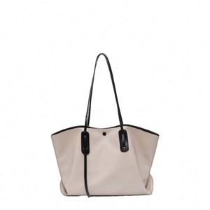 กระเป๋าถือลายนูนสำหรับผู้หญิง - Product Image 1
