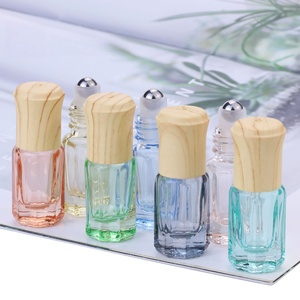 Botella de Vidrio de 3ml con Bola de Vidrio de Anís Estrellado de Colores, Tapa de Acero con Diseño de Madera, Botella Pequeña para Aceite Esencial, Botella Pequeña para Perfume - Product Image 1