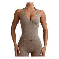 Tops activos de entrenamiento sin costuras transpirables a la moda para mujer Top de Primavera de talla grande PDS incorporado con cuello Halter de compresión
