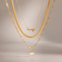 Collier tendance en acier inoxydable plaqué or 18 carats avec chaîne trombone et pendentif marquise en oxyde de zirconium pour femme