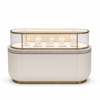 Table de présentation de bijoux sur mesure avec éclairage LED et vitrine en verre pour boutique de bijoux de marque, distributeur et design d'intérieur