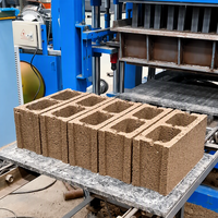 Machine automatique de moulage de blocs creux en béton, ciment, sable et cendres volantes QT4-15