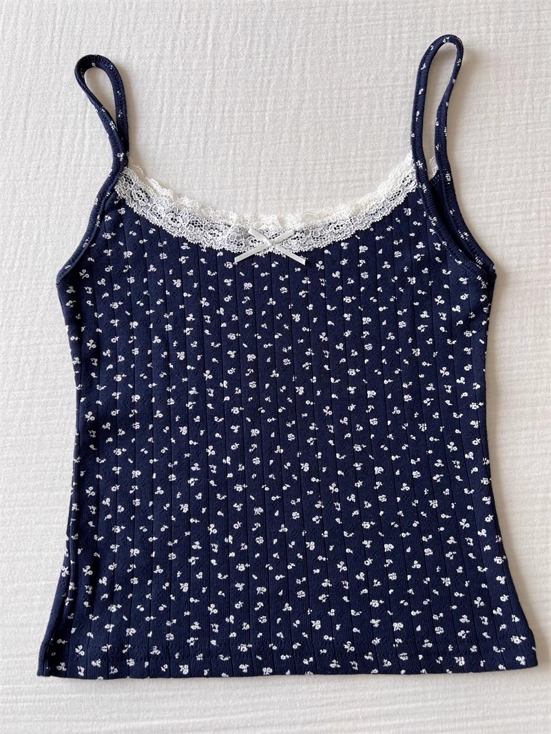 Navy blue bottom with white flower --vest
