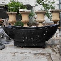 Baignoire autoportante en pierre naturelle de design italien moderne BLVE, baignoire de luxe en marbre noir pour la décoration de villas et d'hôtels