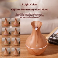 Diffuseur d'huiles essentielles portable mini 200 ml, humidificateur à grain de bois avec 9 couleurs d'éclairage d'ambiance nocturne