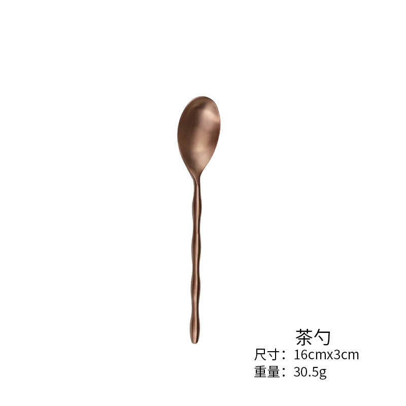 Cuchara de té de oro rosa