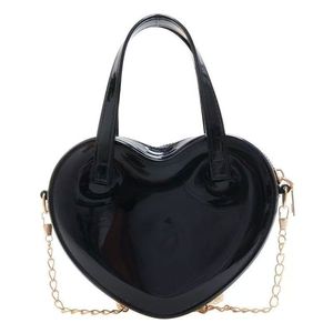 Bolso de Mano Portátil Impermeable de PVC con Forma de Corazón para Mujeres y Niñas Pequeñas, Bolso Cruzado Ligero y Duradero con Cierre de Cremallera - Product Image 5