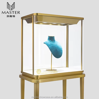 Vitrine haute MASTER en verre, cadre vertical en acier inoxydable doré, vitrine à bijoux en verre trempé, vitrine antivol