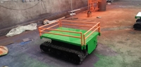 Nouveau robot assemblé sur châssis à chenilles en acier et caoutchouc, télécommandé électriquement, capacité 200 kg, pour le transport et la chargement de charges lourdes