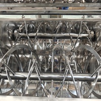 Mélangeur à ruban hélicoïdal double vertical en acier inoxydable Henan pour l'alimentation horizontale de poudres, à vendre
