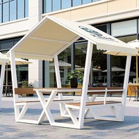 Banc d'extérieur moderne et minimaliste avec auvent, table et chaises intégrées pour cafés, salons de thé et rues commerciales