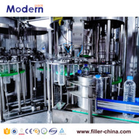 Machine de remplissage automatique de bouteilles de boissons/eau en métal/plastique avec commande PLC et capacité de 200 ml