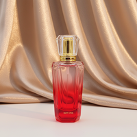 Flacon de parfum marocain rouge et bleu 35 ml en verre avec pompe pulvérisatrice au design torsadé tendance et estampage à chaud