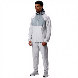 Veste de survêtement légère à capuche pour homme, manches longues, color block, séchage rapide, coupe classique, idéale pour le printemps, en polyester, avec poches latérales zippées - Product Image 1