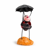 Sculpture de table en fer et résine représentant une coccinelle sur base imitation pierre pour la décoration intérieure, destinée aux acheteurs en gros et aux présentoirs de détail