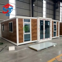 Maison conteneur modulaire préfabriquée portable pliable extensible à panneaux sandwich, design contemporain, pour mini-maisons et hôtels