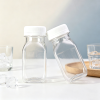 Bouteille vide carrée en plastique PET transparente de 100 ml (3,4 oz) pour café infusé à froid ou jus d'orange, avec bouchons blancs transparents