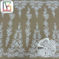 Nouveau Design mariée broderie florale perlée Tulle dentelle tissu français de haute qualité blanc paillettes maille dentelle tissu pour robe de mariée