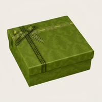Boîte de papier orange de luxe conception de ruban matériaux recyclés boîte-cadeau de Noël décorative vide pour l'emballage de vêtements gaufrage