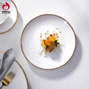 उच्च तापमान कस्टम सोने Seramik व्यंजन Porselen होटल खाने के प्लेट रेस्तरां पूर्ण Tableware सेट चीनी मिट्टी सफेद दौर प्लेट