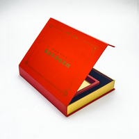 Boîte cadeau en carton noir et rouge en forme de livre avec fermeture magnétique personnalisée, emballage de kit de soins avec insert en mousse