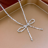 Vente en gros de boucles d'oreilles en argent avec nœud aiguille pour femme, bracelet, collier, parure de bijoux, boucles d'oreilles simples de tempérament et de style froid