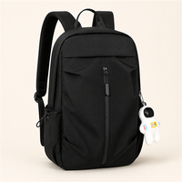 Sac à dos pour ordinateur portable léger OEM personnalisé de 14 pouces avec fermeture éclair frontale verticale, poche antivol et pendentif astronaute pour usage quotidien