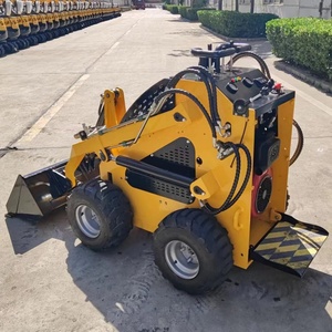 Chargeuse compacte polyvalente avec godet à changement rapide, fourche et souffleuse à neige pour travaux de construction et agricoles efficaces - Product Image 4