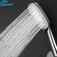 Pommeau de douche à main en plastique chromé à tête circulaire avec bouton interrupteur, jet pluie et massage, design moderne