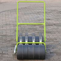Petite machine manuelle de plantation de semoir de légumes d'ail de rangée de poussée de main de 4 pour des ventes