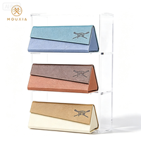 Étui à lunettes pliable triangulaire en PU, bicolore, texture grain de litchi, portable, logo personnalisé disponible