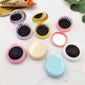 Peigne démêlant massant portable pliable avec finition en alliage de zinc, mini miroir intégré, idéal pour les voyages des enfants - Product Image 3