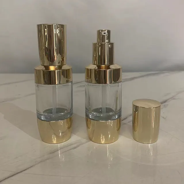 Hengjian Luxury Skincare Embalagem Vazio Round Gold 30ml 1oz Creme Cosméticos De Vidro Jar Toner Loção Bomba Garrafa De Vidro Frasco De Vidro