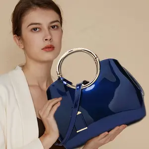 Grosir 2024 tas tangan merek desainer buatan Tiongkok mengilap wanita PU tas kualitas tinggi Logo tas tangan kustom untuk wanita mewah