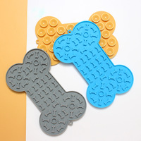 Nouveau tapis de léchage transfrontalier pour animaux de compagnie, gamelle lente en silicone de qualité alimentaire en forme d'os pour chien SH5.1, tapis d'alimentation pour animaux