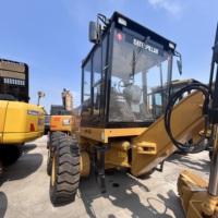 Niveleuse Caterpillar 140H d'occasion, 185 CV, lame de 12 pieds, ripper arrière, modèle 2024, 14700 kg, pour travaux routiers et maintenance, en bon état