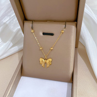 Collier en acier inoxydable plaqué or 18 carats avec pendentif nœud et chaîne perlée, forme papillon, pour femme, idéal pour les fêtes et le quotidien, vente en gros