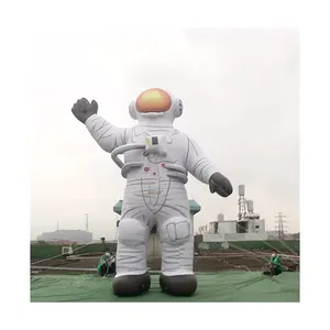 Advertising giant inflatable alien astronaut spaceman characters flying space man