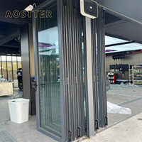 Porte pliante AOSTTER en aluminium argenté architectural avec extrusion métallique épaissie et quincaillerie de verrouillage sécurisée pour centre commercial
