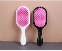 Brosse à cheveux magique YL personnalisée, petite, ovale, noire, avec poignée en plastique étanche, idéale pour salon et usage domestique, vente directe usine